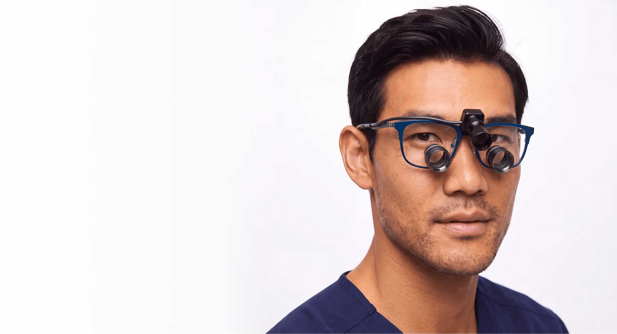 Clinician wearing BD surgical loupes